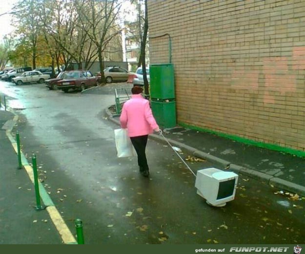 his-person-walking-their-computer his-person-walking-their-computer