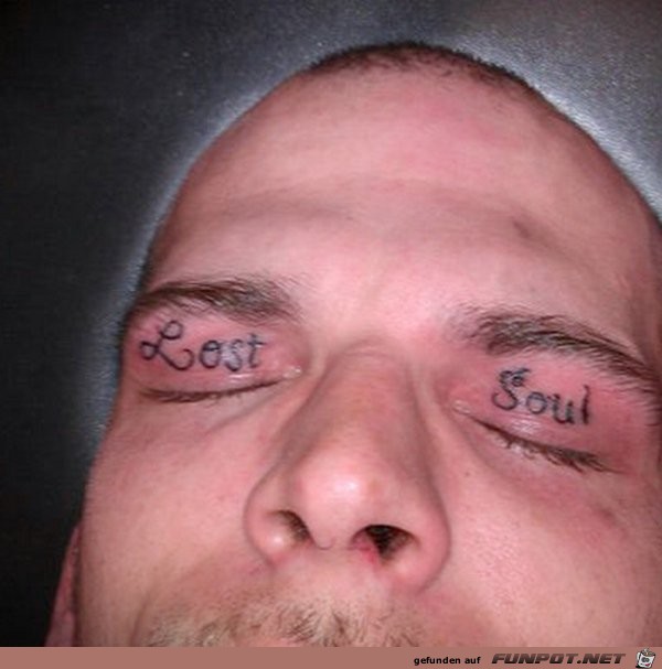 strange-bizarre-pics-of-eyelid-tattoos-1