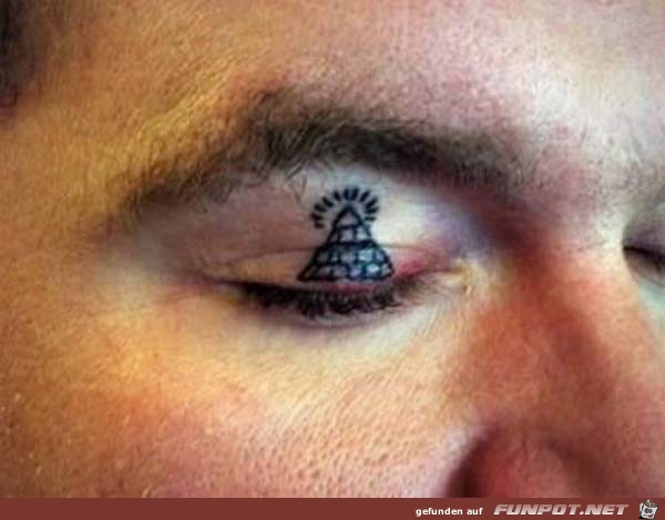 strange-bizarre-pics-of-eyelid-tattoos-8