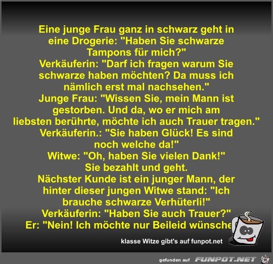 Eine junge Frau ganz in schwarz geht in eine Drogerie Eine junge Frau ganz in schwarz geht in eine Drogerie
