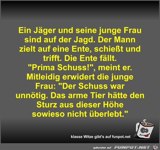 Ein Jäger und seine junge Frau sind auf der Jagd Ein Jäger und seine junge Frau sind auf der Jagd