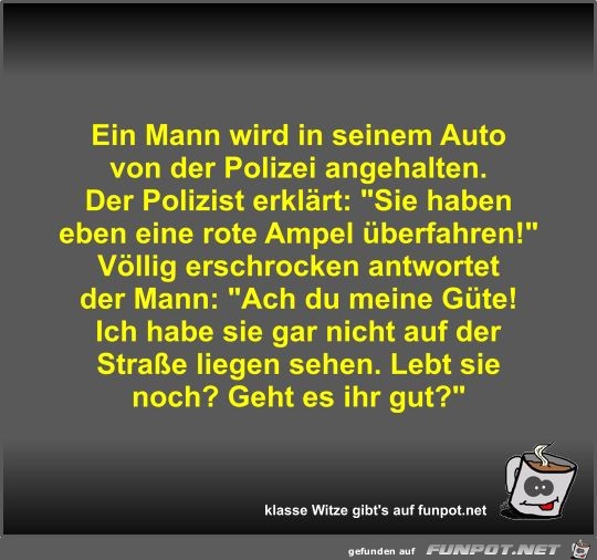Ein Mann wird in seinem Auto von der Polizei angehalten Ein Mann wird in seinem Auto von der Polizei angehalten