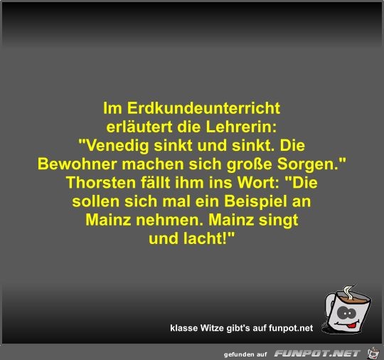 Im Erdkundeunterricht erläutert die Lehrerin Im Erdkundeunterricht erläutert die Lehrerin