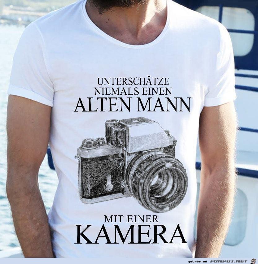 Alter Mann mit Kamera