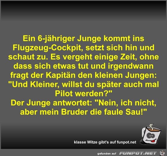 Ein 6-jhriger Junge kommt ins Flugzeug-Cockpit