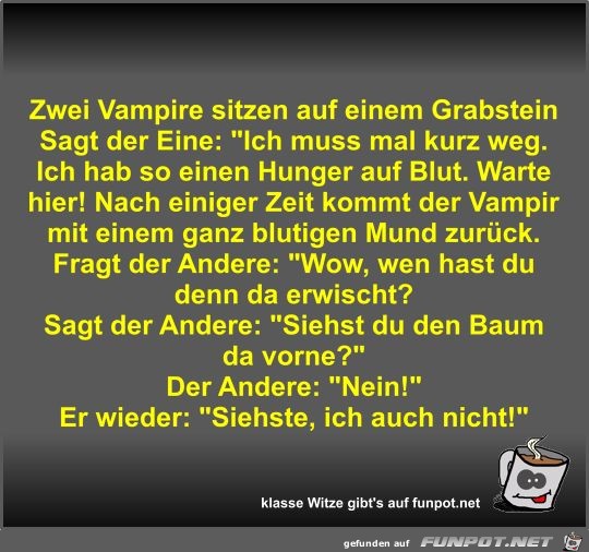 Zwei Vampire sitzen auf einem Grabstein