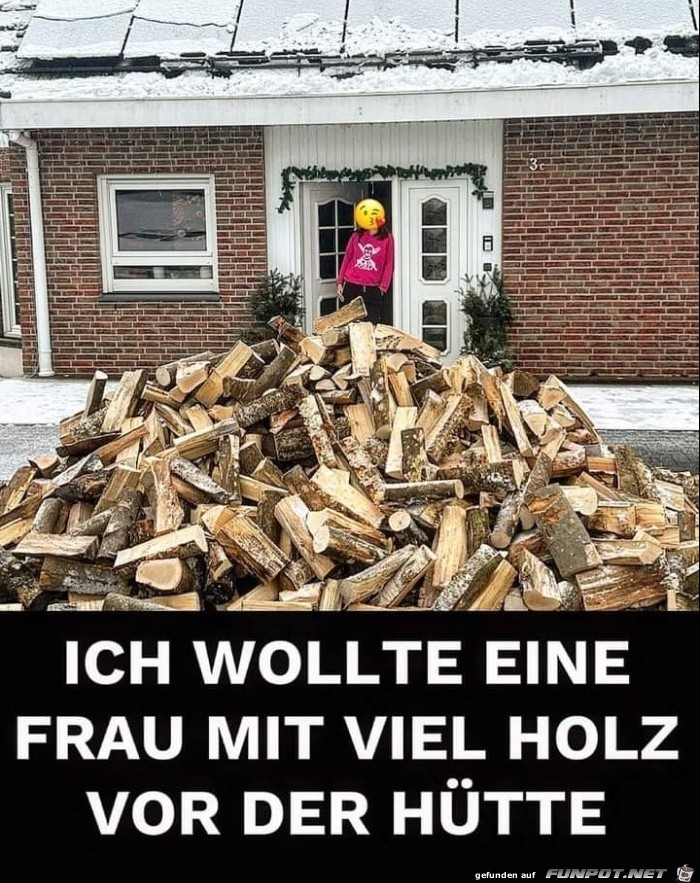 Frau mit Holz vor der Htte