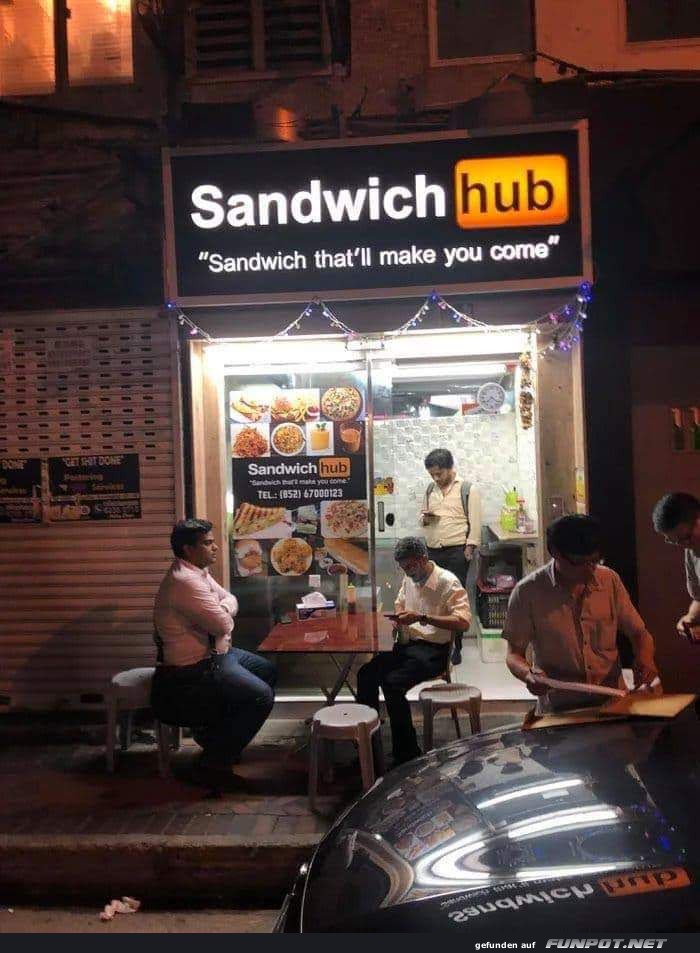 Gemütliches Sandwich-Restaurant bei Nacht Gemütliches Sandwich-Restaurant bei Nacht