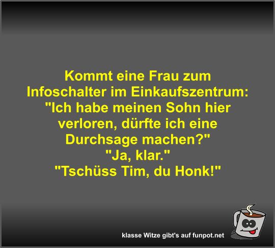 Kommt eine Frau zum Infoschalter im Einkaufszentrum Kommt eine Frau zum Infoschalter im Einkaufszentrum