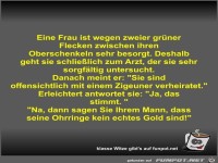 Eine Frau ist wegen zweier gr�ner Flecken zwischen ihren...