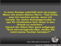 In einer Kneipe unterhlt sich ein junger Mann mit einem...