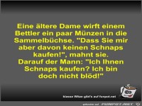 Eine �ltere Dame wirft einem Bettler ein paar M�nzen in die