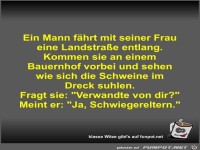 Ein Mann f�hrt mit seiner Frau eine Landstra�e entlang