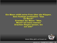 Ein Mann st��t seine Frau �ber die Klippen