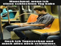 Mann mit Kopfh�rern in der U-Bahn