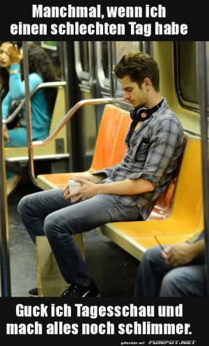 Mann-mit-Kopfhörern-in-der-U-Bahn.jpg auf www.funpot.net
