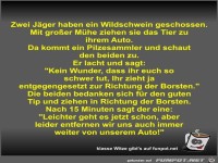 Zwei J�ger haben ein Wildschwein geschossen