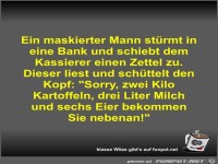 Ein maskierter Mann st�rmt in eine Bank und schiebt dem...