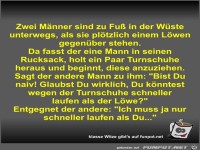Zwei M�nner sind zu Fu� in der W�ste unterwegs
