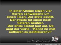In einer Kneipe sitzen vier Herren schweigend um einen Tisch