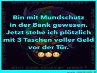 Mit Mundschutz in der Bank