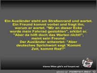 Ein Ausl�nder steht am Stra�enrand und wartet