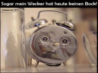 Lustiger Wecker mit Gesichtsausdruck